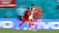 Eden Hazard bermain 90 menit penuh ketika Timnas Belgia bersua Finlandia pada pertandingan terakhir Grup B Euro 2020 di Saint Petersburg Stadium, Selasa (22/6/2021) dini hari WIB. (AP Photo/Dmitri Lovetsky, Pool)