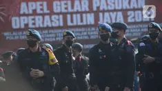 Apel gelar pasukan Operasi Lilin Jaya 2021 di lapangan Polda Metro Jaya, Jakarta, Kamis (23/12/2021). Delapan ribu personel gabungan diturunkan dalam melaksanakan Operasi Lilin Jaya 2021 di wilayah DKI Jakarta yang akan dimulai 24 Desember 2021 - 2 Januari 2022. (merdeka.com/Imam Buhori)