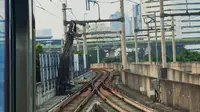 Muatan crane jatuh timpa jalur MRT Jakaarta. (Istimewa)