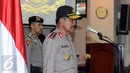 Kapolri Jenderal Pol Badrodin Haiti memimpin upacara laporan kenaikan pangkat 17 perwira tinggi polri di Mabes Polri Jakarta, Kamis (30/6). Kabareskrim, Ari Dono Sukmanto resmi berpangkat Komisaris Jenderal Polisi. (Liputan6.com/Helmi Fithriansyah)