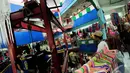 Teknisi sedang memasang eskalator di Blok G, Pasar Tanah Abang, Jakarta Pusat, Selasa (8/7/2014) (Liputan6.com/Faizal Fanani)