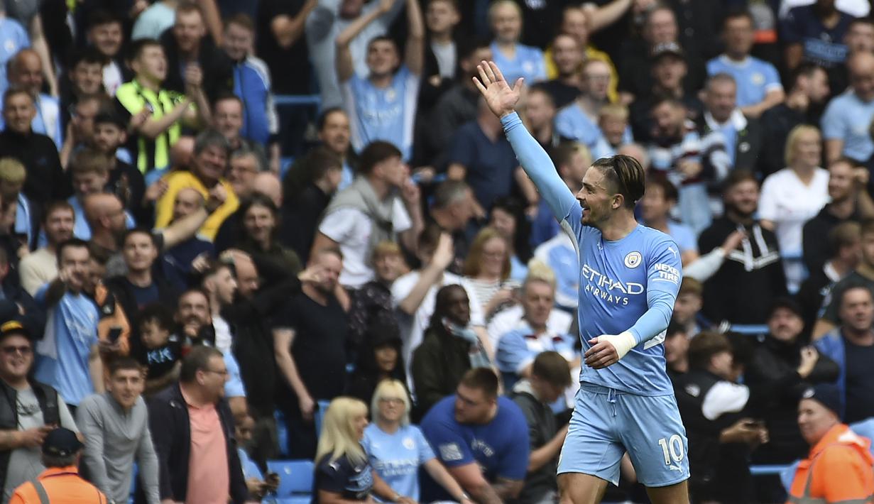 Gelandang Manchester City, Jack Grealish berselebrasi usai mencetak gol ke gawang Norwich City pada pertandingan pekan kedua Liga Inggris di stadion Etihad di Manchester, Inggris, Sabtu (21/8/2021). Jack Grealish mencetak gol debut untuk Manchester City ke gawang Norwich City. (AP Photo/Rui Vieira)