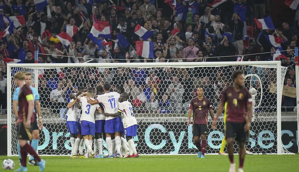 Dua gol kemenangan Prancis ke gawang Belgia masing-masing dicetak oleh Randal Kolo Muani di babak pertama dan Ousmane Dembele di babak kedua. (AP Photo/Laurent Cipriani)
