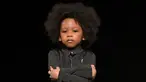 Gaya seorang model cilik pria saat berada di atas catwalk membawakan busana Lil XO Kings selama petitePARADE  di Children's Club di Jacob Javits Center, New York, AS (9/1). (Mike Coppola/Getty Images for petitePARADE/AFP)