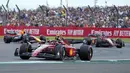 Pembalap Ferrari Carlos Sainz mengemudikan mobilnya saat balapan F1 GP Inggris 2022 di Sirkuit Silverstone, Silverstone, Inggris, 3 Juli 2022. F1 GP Inggris 2022 dimenangkan oleh Carlos Sainz, selanjutnya diikuti Sergio Perez dan Lewis Hamilton. (AP Photo/Frank Augstein)
