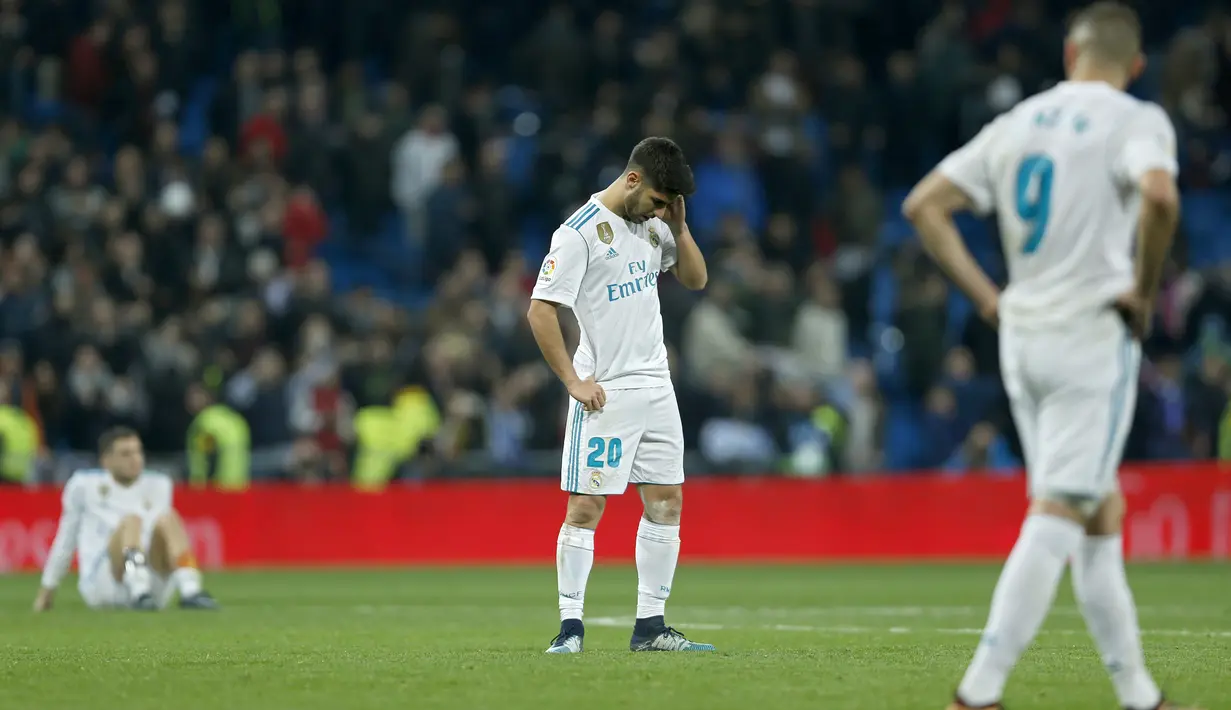 Ekspresi para pemain Real Madrid setelah timnya kalah dari Leganes pada perempat final Copa del Rey di Santiago Bernabeu stadium, Madrid, (24/1/2018). Leganes menang 2-1. (AP/Francisco Seco)