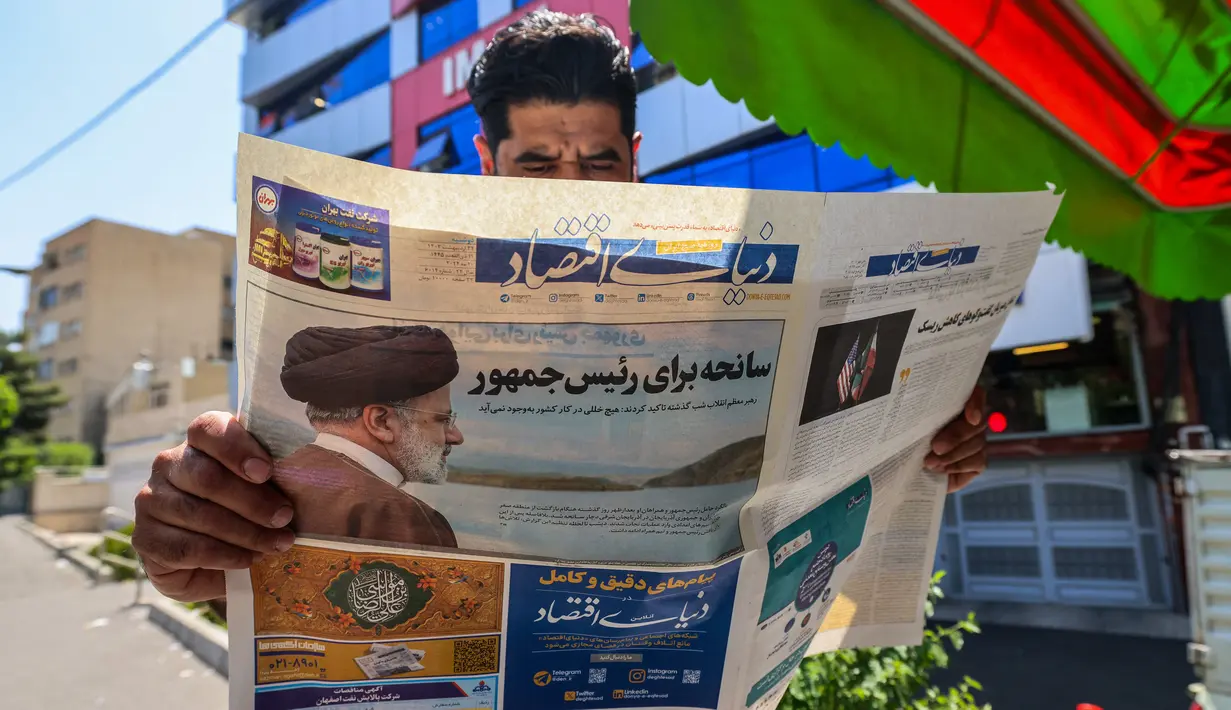 Menurut Konstitusi Iran, jika presiden meninggal atau tidak mampu, wakil presiden pertama akan mengambil alih jabatan tersebut hingga pemilu diadakan dalam jangka waktu maksimal 50 hari. (Atta KENARE / AFP)