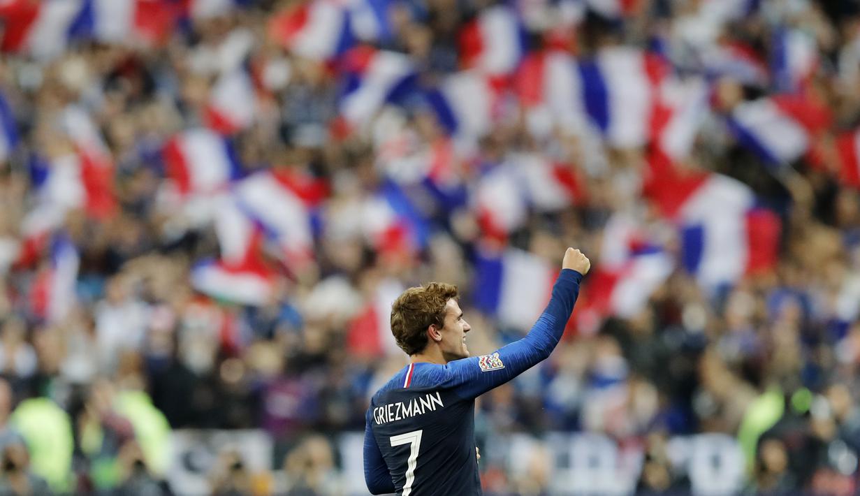 Penyerang Prancis, Antoine Griezmann, melakukan selebrasi usai membobol gawang Jerman pada laga UEFA Nations League di Stade de France, Paris, Selasa (16/10/2018). Prancis menang 2-1 atas Jerman. (AP/Christophe Ena)