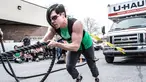 Seorang wanita menarik truk dengan tubuhnya saat kompetisi May Queen Spring Strongwoman di Lancaster, Pennsylvania, AS (25/4). Kegiatan tersebut untuk memperingati Hari Ibu. (Reuters)