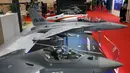 (Depan ke belakang) Model skala pesawat tempur KF-21 yang sedang dalam pengembangan, pesawat tempur ringan FA-50, pesawat latih KT-1 dan pesawat lain yang diproduksi oleh Korea Aerospace Industries (KAI) dipamerkan pada Singapore Airshow 2022, Singapura, Selasa (15/2/2022). (ROSLAN RAHMAN/AFP)