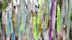 Pita yang mengharapkan perdamaian dan penyatuan kembali Semenanjung Korea digantung di pagar militer di taman perdamaian Imjingak dekat Zona Demiliterisasi (DMZ) yang memisahkan kedua Korea di Paju pada tanggal 14 Oktober 2024. (JUNG YEON-JE/AFP)
