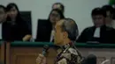 Budi Mulya mengaku kecewa setelah dijatuhi hukuman 10 tahun penjara oleh majelis hakim, PN Tipikor, Jaksel, Rabu (16/7/2014) (Liputan6.com/Miftahul Hayat)