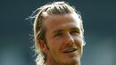 9. David Beckham - Pemain flamboyan yang menjadi trensetter di setiap penampilan diluar lapangan. Di dalam lapangan pun Beckham berhasil menggondol banyak trofi bergengsi bersama klubnya saat itu Manchester United.(AFP/Paul Marriott)