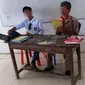 Sang siswa mengaku melakukan aksi yang menghina gurunya tersebut hanya sebagai bahan candaan semata. (Liputan6.com/Fauzan)