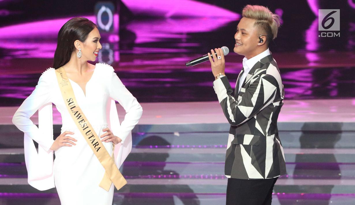 Penyanyi Rizky Febian saat tampil pada malam final Miss Grand Indonesia 2018 di JCC Jakarta, Sabtu (21/7). Rizky Febian membawakan dua lagu pada malam final. (Liputan6.com/Angga Yuniar)