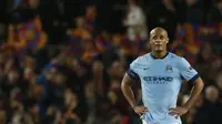 Football - FC Barcelona v Manchester City - UEFA Champions League Second Round Second Leg - The Nou Camp, Barcelona, Spain - 18/3/15 Manchester City's Vincent Kompany looks dejected after Barcelona's first goal Action Images via Reuters / Carl Recine Live