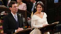 Putri Eugenie - Jack Brooksbank resmi menikah. (Jonathan Brady / POOL / AFP)