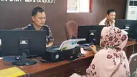 SPK Polda Sumsel mendapatkan laporan penipuan paket sembako murah yang dialami oleh warga Kota Palembang Sumsel (Liputan6.com / Nefri Inge)
