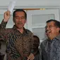 Presiden terpilih Joko Widodo dan Jusuf Kalla di Rumah Transisi saat mengumumkan postur kabinet (Liputan6.com/Herman Zakharia)