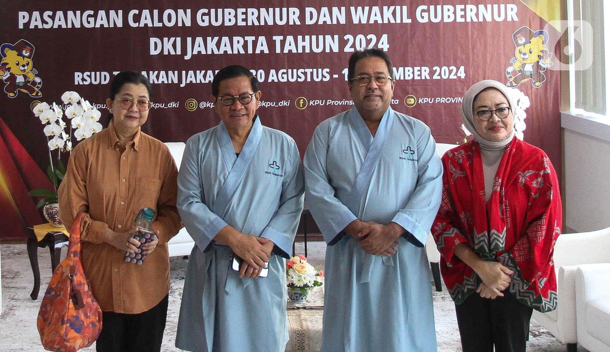 Pasangan bakal calon gubernur-calon wakil gubernur Jakarta 2024, Pramono Anung-Rano Karno bersiap menjalani pemeriksaan Kesehatan di RSUD Tarakan, Jakarta, Jumat (30/8/2024). (Liputan6.com/Herman Zakharia)
