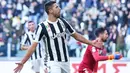 Pemain Juventus, Sami Khedira merayakan golnya ke gawang Sassuolo pada lajutan Serie A di Allianz Stadium, Turin (4/2/2018). Juventus menang 7-0. (Alessandro Di Marco/ANSA via AP)