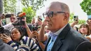Hadiah-hadiah yang diterima Iswaran termasuk tiket Grand Prix Formula 1, sepeda Brompton T-line, alkohol, dan tumpangan jet pribadi. (ROSLAN RAHMAN/AFP)