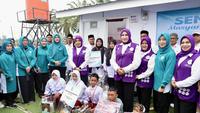 Tri Tito Karnavian salurkan bantuan sosial dan kegiatan senam sehat bersama anak-anak di Huntara Desa Tanjung Dalam Selatan, Kecamatan Langkahan, Kabupaten Aceh Utara, Rabu (29/4/2026)