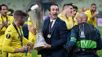 Unai Emery benar-benar meraih gelar keempat Liga Europa bersama Villarreal. Dalam laga final yang digelar di Gdansk Stadium, Polandia, 26 Mei 2021, Villarreal mengalahkan favorit juara Manchester United melaui melalui adu penalti dengan skor 12-11. (AFP/Michael Sohn/Pool)