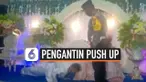 POLISI HUKUM PENGANTIN PRIA PUSH UP DI PELAMINAN