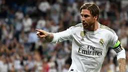 Sergio Ramos (71 gol) - Sergio Ramos menjadi bek yang sangat produktif di kompetisi La Liga musim ini. Kapten Real Madrid ini telah menorehkan 69 gol untuk El Real dan 2 gol saat besama Sevilla. (AFP/Pierre-Philippe Marcou)