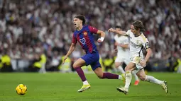 Real Madrid sukses menaklukkan rival abadinya Barcelona 3-2 di laga klasik El Clasico. (AP Photo/Manu Fernandez)