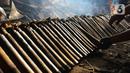 Lemang bambu ini dijual dengan harga jual sebesar Rp 17 ribu per bambu. (Liputan6.com/Herman Zakharia)
