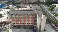 Gedung di Shanghai yang pindah ke lokasi baru dengan berjalan menggunakan 198 kaki robot (credit: Shanghai Evolution Shift Project)