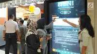 Nasabah mendapatkan informasi produk perbankan saat peringatan Hari Pelanggan Nasional di Kantor BNI Mall  Kota Kasablanka, Jakarta, Selasa (4/9). (Merdeka.com/Arie Basuki)