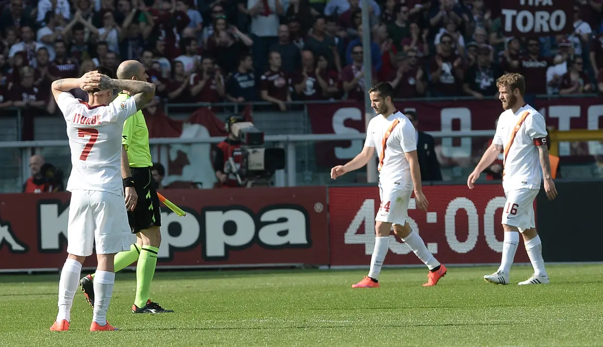 Hasil imbang ini membuat I Giallorossi turun ke posisi tiga klasemen sementara Serie A. Roma mendulang 57 angka atau tertinggal satu poin atas Lazio yang berada di atasnya. (AP Photo/Massimo Pinca)