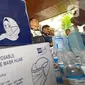 Barang bukti masker dan hand sanitizer botol ditunjukkan saat rilis di Polda Jateng, Semarang, Selasa (4/3/2020). Menurut Kabid Humas Polda Jateng, Kombes Iskandar F Sutisna, penangkapan tersangka berawal dari patroli siber saat masker mengalami kelangkaan di pasaran. (Liputan6.com/Gholib)