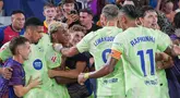 Pemain Barcelona merayakan gol ke gawang Levante pada jornada kedua La Liga 2025/2026 di Estadio Ciudad de Valencia, Minggu (24/8/2025) awal hari WIB. (AP Photo/Alberto Saiz)