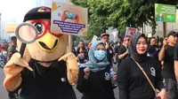 Sosialisasi ini mengajak masyarakat untuk ikut menyukseskan pelaksanaan Pilkada Serentak 2024. (merdeka.com/Arie Basuki)