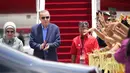 Presiden Turki Recep Tayyip Erdogan didampingi istrinya Emine tiba di Bandara Internasional Ngurah Rai menjelang KTT G20 di Bali, Indonesia, Senin (14/11/2022). Presiden Turki Recep Tayyip Erdogan tiba di Bali untuk menghadiri Konferensi Tingkat Tinggi (KTT) G20 Bali. (AP Photo/Firdia Lisnawati )