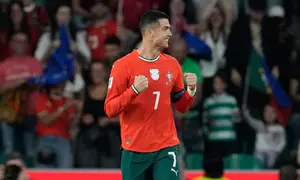Selebrasi Cristiano Ronaldo dalam laga Kualifikasi Piala Dunia 2026 antara Portugal vs Hungaria, Rabu (15/10/2025).&nbsp;(AP Photo/Armando Franca)