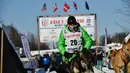 Ryan Redington meninggalkan garis start Iditarod Sled Dog Race di Deshka Landing di Willow, Alaska, Minggu (7/3/2021). Jarak yang harus ditempuh biasanya hampir 1.000 mil dan tahun ini dikurangi menjadi sekitar 100 mil. (Marc Lester/Anchorage Daily News via AP)