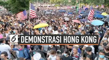 Aksi unjuk rasa masih berlangsung di Hong Kong. Ribuan warga Hong Kong turun ke jalan hari Minggu (8/9/2019), sebagian mereka bawa bendera Amerika Serikat. Untuk apa?