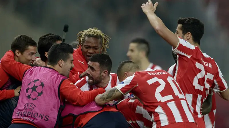 Selebrasi Pemain Olympiakos Piraeus (AFP/Aris Messinis)