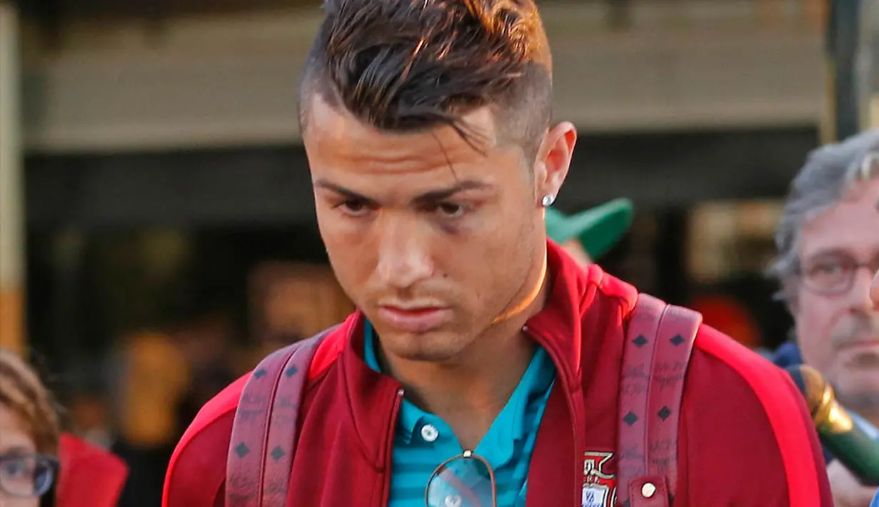 Pemain terbaik dunia, Cristiano Ronaldo dan skuad Portugal telah kembali ke Portugal, Sabtu (28/6/2014) (Reuters/HUGO CORREIA)