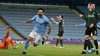 Gelandang Manchester City, Ilkay Gundogan, berhasil mencetak dua gol saat timnya meraih kemenangan 3-0 atas Tottenham Hotspur pada laga pekan ke-24 Premier League di Stadion Etihad, Minggu (14/2/2021) dini hari WIB. (AFP/RUI VIEIRA)