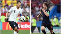 Duo Real Madrid, Raphael Varane dan Luka Modric, saling sikut di final Piala Dunia 2018. (AFPFranck Fife, Pierre-Philippe Marcou)