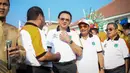 Gubernur DKI, Basuki Tjahaja Purnama dan Wagub Djarot Saiful Hidayat saat menghadiri pembukaan perayaan HUT Jakarta yang ke-488, di Taman Fatahillah, Jakarta, Minggu (31/5/2015). (Liputan6.com/Faizal Fanani)