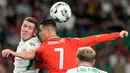 Kemenangan tipis 1-0 tersebut membuat Portugal kukuh di puncak klasemen sementara Grup F dengan mengoleksi 9 poin. (AP Photo/Armando Franca)