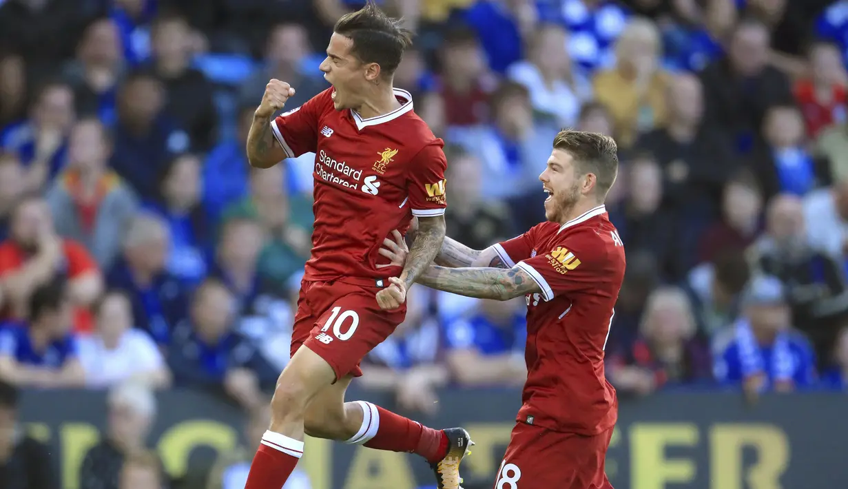  Philippe Coutinho (kiri) berteriak emosional usai membobol gawang Leicester City pada laga Premier League di King Power Stadium, Leicester, (23/9/2017). Coutinho mencetak perdana bagi Liverpool di Premier League. (Mike Egerton/PA via AP)