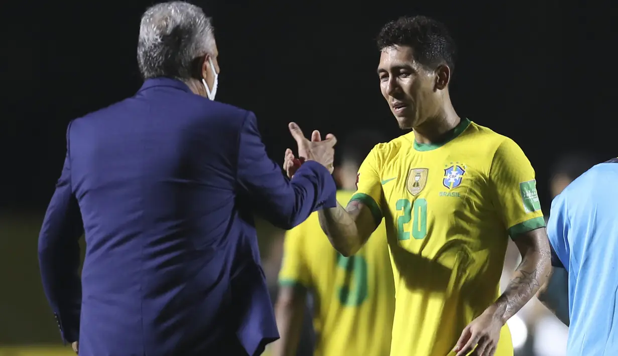 Pada Piala Dunia 2018 lalu Roberto Firmino masih menjadi andalan Tite di lini serang Timnas Brasil. Ia juga kemudian menjadi bagian Tim Samba saat menjuarai Copa America 2019, hingga penampilannya di Copa America 2021 saat menempati posisi runner-up menjadi akhir ia mendapat kepercayaan Tite. (AFP/Pool/Fernando Bizerra)